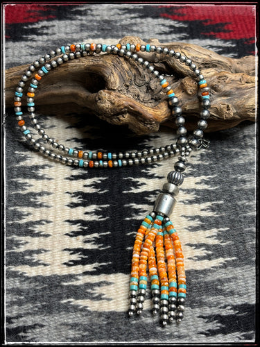Sterling silver beads, orange spiny oyster shell beads and turquoise beads on a 28