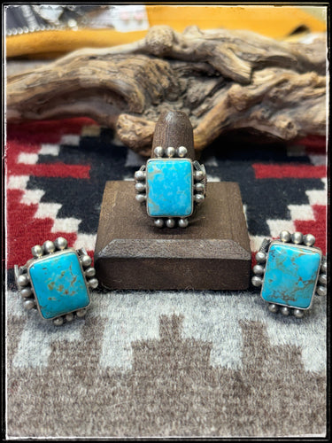 Michael Calladitto, Navajo silversmith.  Sterling silver and Kingman turquoise square rings.