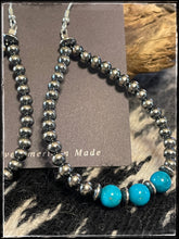 Load image into Gallery viewer, A mixed mm, sterling silver pearl style beads with turquoise beads, on French wires.

