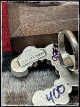 Load image into Gallery viewer, Donovan Skeets, Navajo silversmith. Sterling silver and Kingman turquoise Naja ring with an adjustable band.  Hallmark stamp. 
