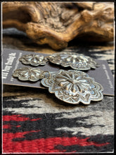 Load image into Gallery viewer, Jenny Blackgoat, Navajo silversmith. Sterling silver, handstamped, concho earrings. 
