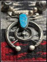 Load image into Gallery viewer, Matha Cayatineto sterling silver Naja with turquoise. Handmade beads with matching earrings from Navajo silversmith Calvin Largo.   Closeup of Naja. 
