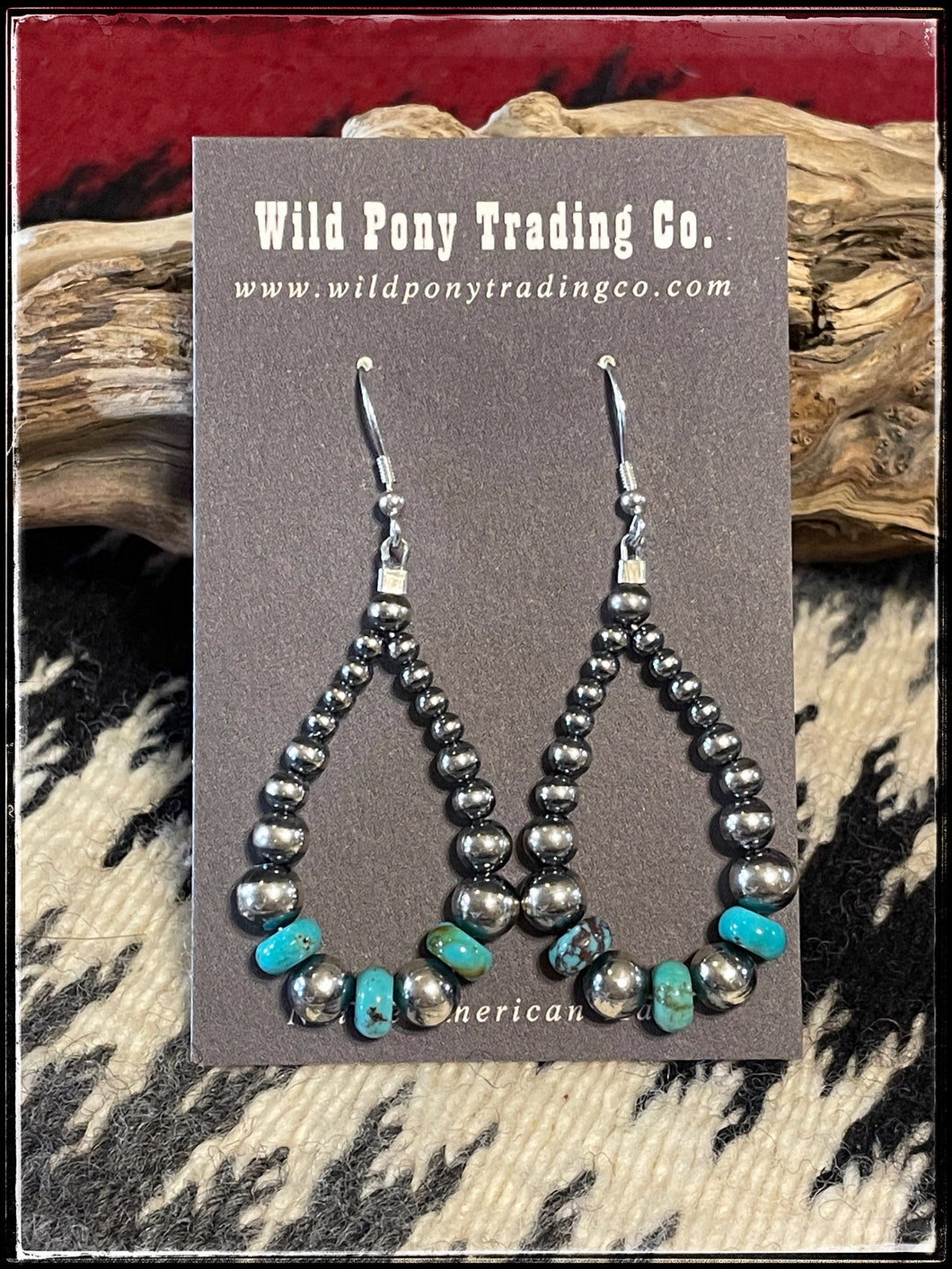A mixed mm, sterling silver pearl style beads with turquoise beads, on French wires.