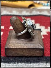 Load image into Gallery viewer, Jaunita McDonald, Navajo silversmith. Sterling silver and white buffalo ring with an adjustable band.
