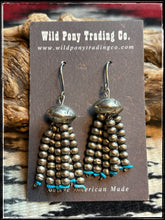 Load image into Gallery viewer, Jan Mariano, Navajo silversmith. Handmade bead chandalier earrings with one larger bead and six strands of 4mm pearl beads and turquoise ends

