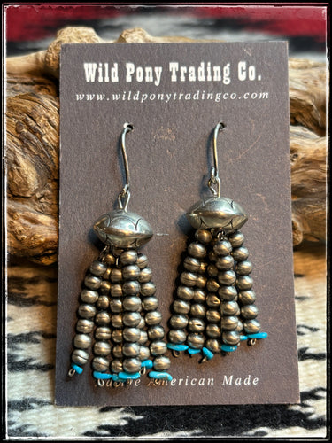 Jan Mariano, Navajo silversmith. Handmade bead chandalier earrings with one larger bead and six strands of 4mm pearl beads and turquoise ends