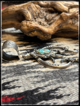 Load image into Gallery viewer, Sterling silver and turquoise Naja necklace from Native American artists Francis L Begay and Rosella Paxson. 
