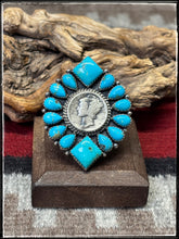 Load image into Gallery viewer, Annie Spencer, Navajo silversmith.  Sterling silver, Kingman turquoise, and a mercury dime cluster ring with an adjustable band. 
