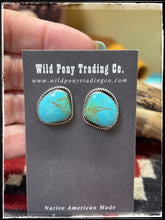 Load image into Gallery viewer, Judith Dixon, Navajo silversmith.  Sterling silver and Kingman turquoise stud earrings. 
