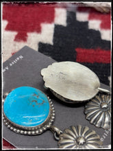 Load image into Gallery viewer, Blaine Yellowhorse, Navajo silversmith.  Sterling silver and Kingman turquoise concho drop earrings Hallmark stamp 
