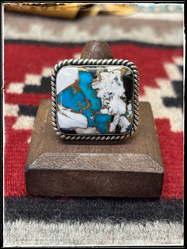 Alfred Martinez, Navajo silversmith.  Sterling silver and Kingman Krush (composite) square ring. 