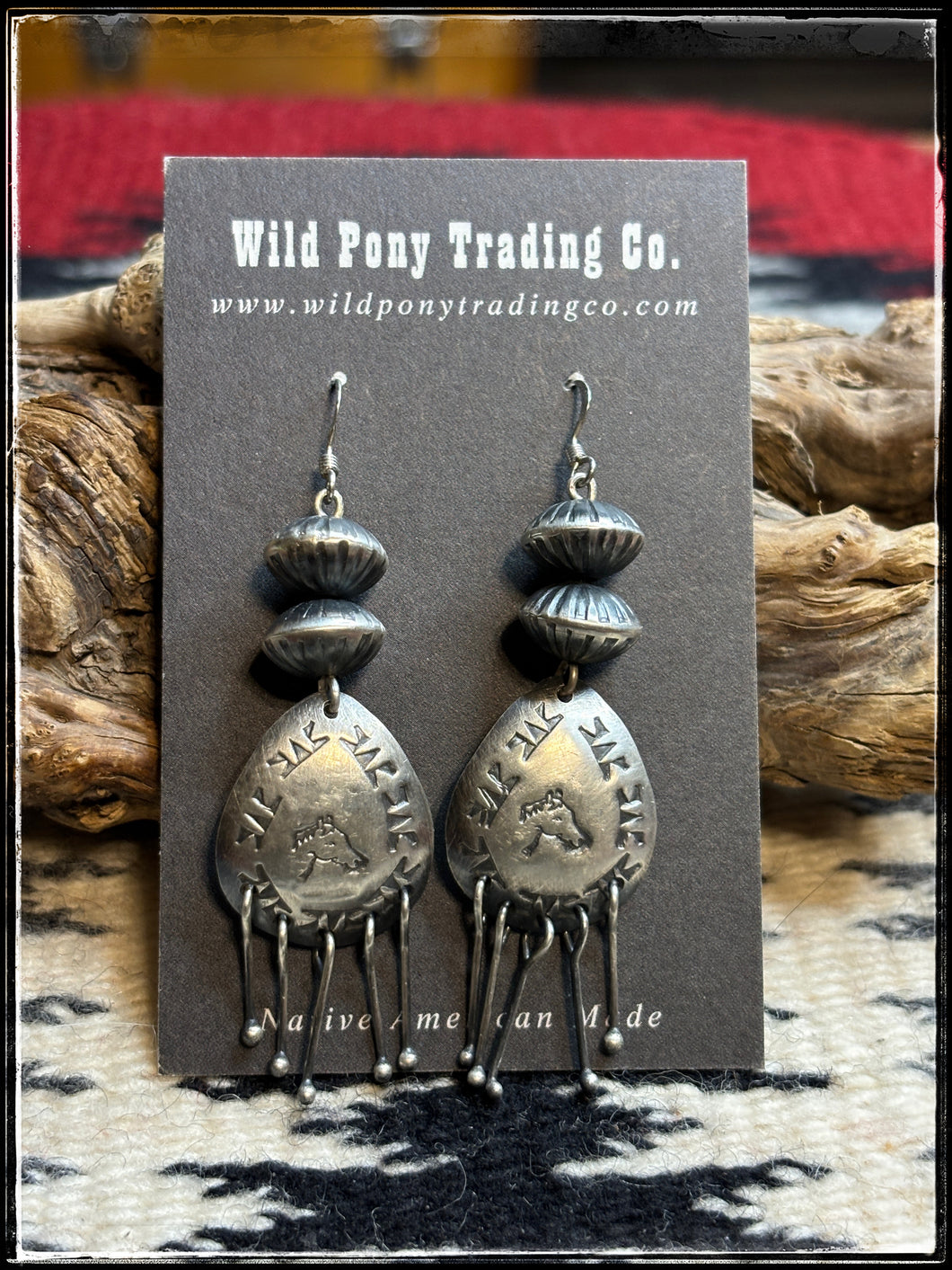 {reston Haley, Navajo silversmith. Handmade sterling silver beads with hammered discs and sterling fringe.