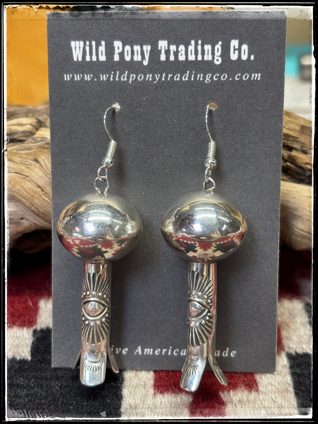 Garrett Hale, Navajo silversmith.  Sterling silver and great attention to stamped detail.  Blossom earrings. 
