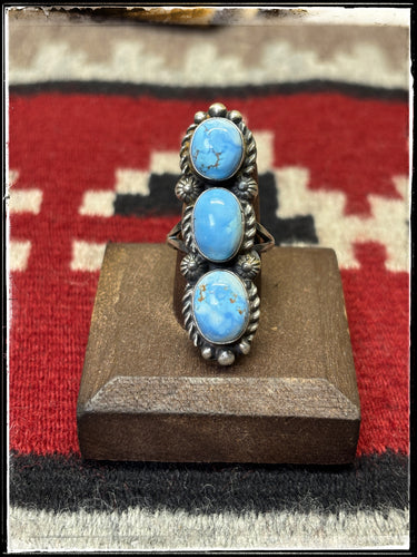 Robert Shakey, Navajo silversmith. A triple Golden Hills stone ring set in sterling silver. Size 7 1/2. 