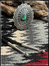 Load image into Gallery viewer, Sterling silver and Sonoran Gold turquoise bolo ties with black, braided, leather cords and sterling silver tips.
