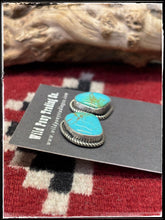 Load image into Gallery viewer, Judith Dixon, Navajo silversmith.  Sterling silver and Kingman turquoise stud earrings. 
