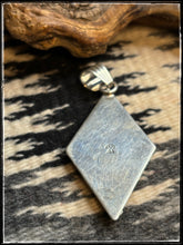 Load image into Gallery viewer, Sterling silver and turquoise, dot &amp; cross pattern pendant with a small bail .  Hallmark. 

