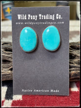 Load image into Gallery viewer, Eugene Gruber, Navajo silversmith.  Sterling silver and oval turquoise studs.  
