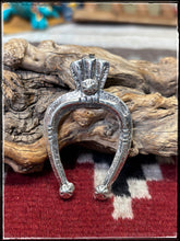Load image into Gallery viewer, Del Areviso, Navajo silversmith.  Sterling silver and sleeping beauty turquoise on tufa cast Naja pendants with shepherd's hooks. Choice B 
