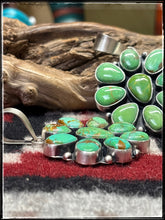 Load image into Gallery viewer, Rena Shelly, Navajo silversmith.  Sterling silver and Cactus Moon turquoise cluster pendants. 
