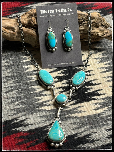 Augustine Largo, Navajo silversmith. Kingman turquoise Y necklace set with matching earrings. 