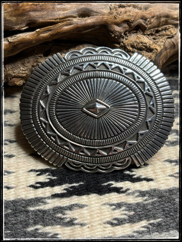 Orville White, Navajo silversmith.  Sterling silver belt buckle. 