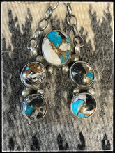 Load image into Gallery viewer, Augustine Largo, Navajo silversmith.  Kingman Krush - a composite of White Buffalo, Kingman turquoise and bronze  in the form a Naja. Five total stones. 
