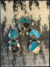 Load image into Gallery viewer, Augustine Largo, Navajo silversmith.  Kingman Krush - a composite of White Buffalo, Kingman turquoise and bronze  in the form a Naja. Five total stones. 
