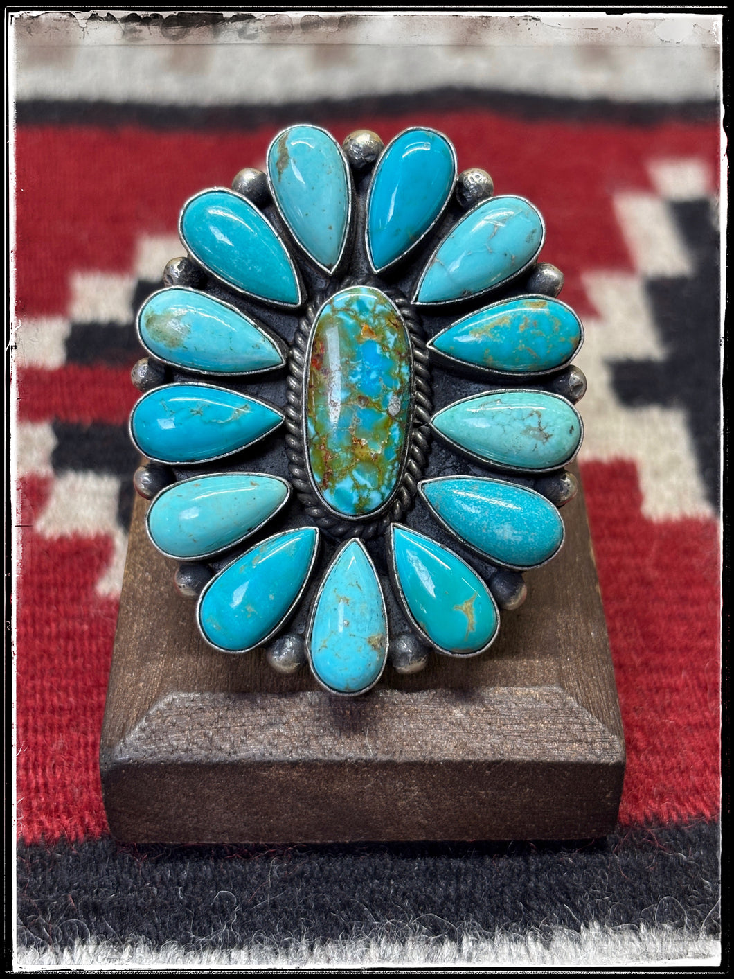 Mary Ann Spencer, Navajo silversmith. Large, turquoise cluster ring.