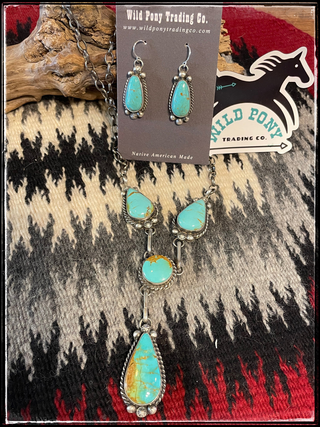 Sterling silver and Kingman turquoise Y necklace set with earrings from Navajo silversmith Augustine Largo.