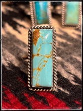 Load image into Gallery viewer, Kingman turquoise and sterling silver rings with an adjustable band from Navajo silversmith Alfred Martinez.. D
