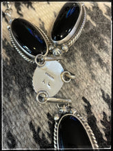 Load image into Gallery viewer, Sterling silver and onyx Y necklace set with earrings from Navajo silversmith Augustine Largo. - hallmark
