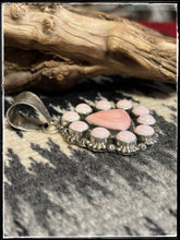 Load image into Gallery viewer, Pansy Johnson, Navajo silversmith., Pink conch cluster pendant set in sterling silver with an extra large bail.
