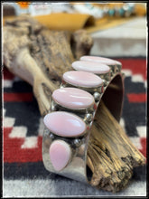 Load image into Gallery viewer, Pansy Johnson, Navajo silversmith.  Sterling silver and pink conch row cuff. 
