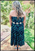 Load image into Gallery viewer, A vibrant turquoise squash blossoms and a black slip underneath maxi skirt back worn as a maxi dress
