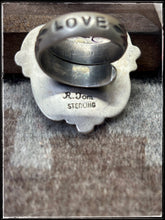 Load image into Gallery viewer, Ronald Tom, Navajo silversmith. Sterling silver and denim lapis heart shape stones. Rings have an adjustable band with stampwork. 
