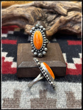 Load image into Gallery viewer, Blaine Yellowhorse, Navajo silversmith.  Sterling silver and orange spiny shell rings. 
