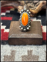 Load image into Gallery viewer, Blaine Yellowhorse, Navajo silversmith.  Sterling silver and orange spiny shell rings. 
