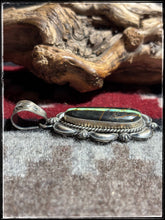 Load image into Gallery viewer, Ray Delgarito, Navajo silversmith.  Sterling silver and Blackjack turquoise pendant.  
