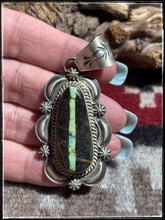 Load image into Gallery viewer, Ray Delgarito, Navajo silversmith.  Sterling silver and Blackjack turquoise pendant.  
