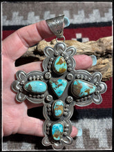 Load image into Gallery viewer, Dean Sandoval, Navajo silversmith.  Sterling silver and turquoise cross pendant.  
