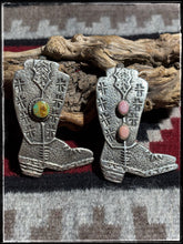 Load image into Gallery viewer, Del Aviso, Navajo silversmith. Sterling silver and either pink conch or kingman turquoise stone boot pendants. 
