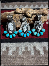 Load image into Gallery viewer, Kee Johnson, Navajo silversmith.  Sterling silver, White Buffalo, and kingman turquoise pendants. 
