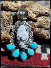 Load image into Gallery viewer, Kee Johnson, Navajo silversmith.  Sterling silver, White Buffalo, and kingman turquoise pendants.  A
