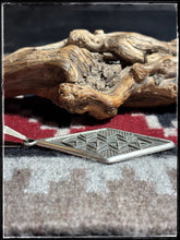 Load image into Gallery viewer, Stanford Yazzie, Navajo silversmith. Sterling silver tufa cast pendant. 
