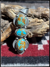 Load image into Gallery viewer, Juanita McDonald, Navajo silversmith.  Sterling silver and turquoise, triple stone pendant. 
