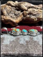 Load image into Gallery viewer, Juanita McDonald, Navajo silversmith.  Sterling silver and turquoise, triple stone pendant. 
