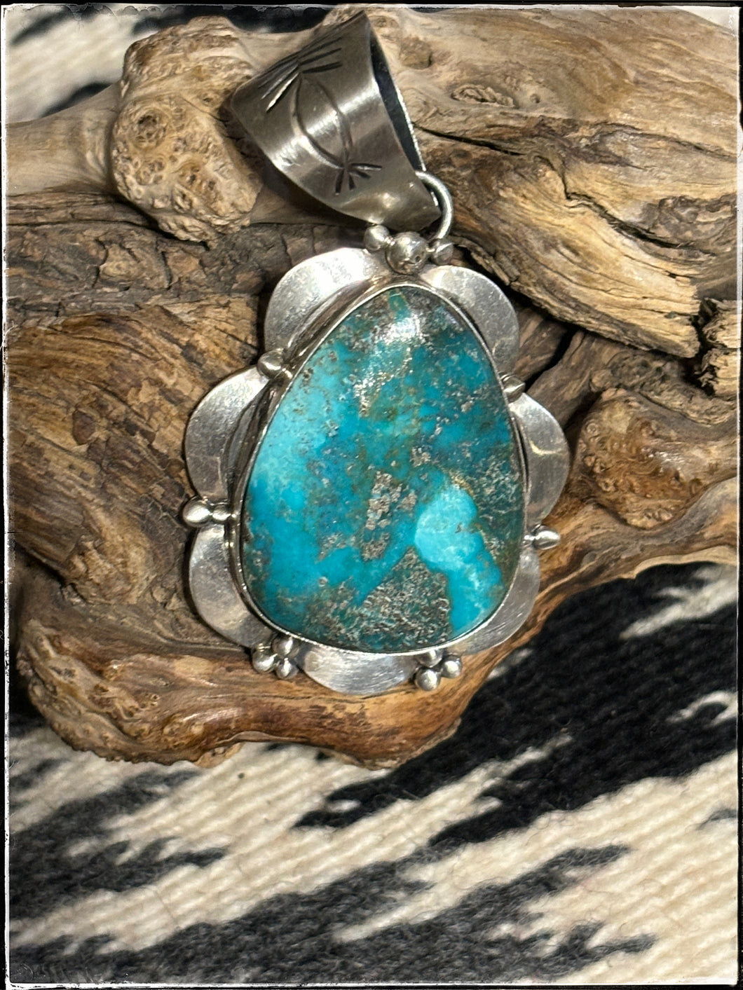 Mary Ann Spencer, Navajo silversmith. Carico Lake turquoise and sterling silver pendant. 