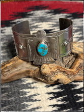 Load image into Gallery viewer, Fred Begay, sterling silver and turquoise thunderbird cuff with a vintage feel.

