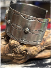 Load image into Gallery viewer, Fred Begay, sterling silver and turquoise thunderbird cuff with a vintage feel.  Side view. 
